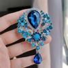 Broche de cristal de estilo retro con incrustaciones de aleación y alfiler de diamantes de imitación, colgante de color, ramillete, ropa transfronteriza entre Europa y Estados Unidos.