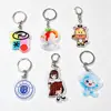 Llaveros acrílicos personalizados, con diseños de caricaturas y anime, logotipos, escudos escolares y pequeños colgantes; también disponible como regalos de aniversario escolar