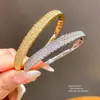 Pulsera con Hebilla Redonda de Circonita Chapada en Oro Real de 18k Pulsera de Lujo Ligero Sensación de Alta Gama Sentido del Diseño Pulsera Joyería de Mano de Nicho Venta al por Mayor