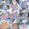 2024 nueva colección japonesa uniforme JK falda a cuadros traje de manga corta para mujer falda plisada uniforme escolar jk para estudiante venta al por mayor generación