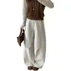 Pantalones casuales holgados de diseño plisado estilo japonés, con corte curvo, para mujer, nuevo modelo de otoño 2026, versátiles de color liso, pierna ligeramente ancha, venta al por mayor