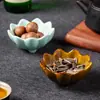 Elegante y sencillo plato de cerámica con forma de loto para casas de té, con nueces, frutas secas y bocadillos; adecuado para uso comercial en salones de té y salas de estar