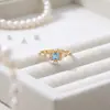 Anel Aberto Geométrico de Topázio Azul Natural de Luxo Leve Japonês Feminino Elegante Versátil Prata Esterlina Floco de Neve Anel de Dedo Fresco