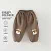 Suministro directo de fábrica de pantalones deportivos de dibujos animados de Clase A para niños y niñas, pantalones holgados de otoño, pantalones deportivos casuales suaves para niños pequeños
