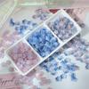 Venta al por mayor 10 mm pequeña flor de ciruelo agujero medio flor de ciruelo tridimensional diy hecho a mano hilo de mano cuentas material de producción para horquilla antigua