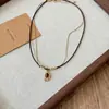 Colar de pérolas com pedra olho de tigre em formato de cruz para outono e inverno, toque de luxo leve e de alta qualidade, corrente de suéter em camadas, acessório versátil de nicho atacado