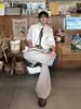 Pantalones casuales de traje a rayas con botones para hombre y mujer, nuevos de otoño vintage versátiles holgados que estilizan con caída y pierna ancha
