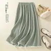 Falda de Algodón Verde a Cuadros de Estilo Nuevo para Verano 2026, con Cintura Elástica Artística y Ribete de Encaje para Mujer