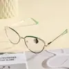 Gafas de alambre dorado estilo ojo de gato de alta gama refinado pícaro montura metálica anti-luz azul monturas de gafas retro europeas y americanas para mujer
