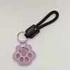Novo pingente memorial criativo para guardar pelos de pet, porta-cartão de acesso à porta anti-perda, pingente de chaveiro de pata de cachorro