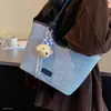 Bolsa tote de ombro único feminina retrô nova moda grande capacidade outono 2026 com charmoso cachorrinho simples coreano