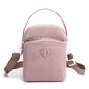 Bolsa pequena de nylon feminina 2022 Nova moda japonesa e coreana Vertical Bolsa para celular Ombro único Bolsa transversal Bolsa leve casual elegante
