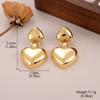 Pendientes de metal geométricos con lazo de amor transfronterizo, personalidad de alto sentido del estilo europeo y americano, pendientes exagerados con incrustaciones de circonita que no se decoloran