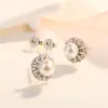 Yihua girasol floreciendo aretes de tachuela de girasol joyería chapada en plata para mujer venta al por mayor aretes de crisantemo y perla combinan con todo