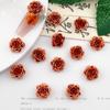 Nuevo retro naranja tie-dye flor suave accesorios de arte de uñas bolsa de material luminoso modelos de explosión en vivo usar accesorios de uñas al por mayor