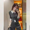 Venta al por mayor transfronteriza Otoño e Invierno Terciopelo Andy Estilo coreano Petite Gris Falso de dos piezas Solapa Manga larga Tejido Prendas superiores para mujer