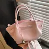 Design de nicho coreano novo 2026 transfronteiriço bolsa de mão de moda para o dia a dia bolsa de balde bolsa de ombro transversal feminina