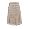 26 Conjunto de camisola de terciopelo negro con lunares estilo coreano de otoño, corte ajustado, cuello en U grande + minifalda de línea A