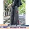 Pantalones largos de marca de moda estilo americano de corte holgado, pantalones deportivos casuales de pierna ancha, pantalones de chándal a rayas de alta resistencia para hombre, diseño deconstruido de otoño