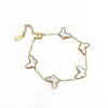 Popular Conjunto de Brincos Borboleta Dupla Face com Toque Dourado, Design de Nicho, Titânio Aço Madre-Pérola, Colar e Pulseira de Alto Padrão Transfronteiriços 18K