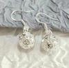 Pendientes de bola de amor huecos chapados en plata nuevos de Corea, pendientes sencillos de moda europea y americana para mujer, venta al por mayor transfronteriza