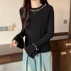 Suéter de cuello redondo con cuentas de la industria pesada para mujer, otoño e invierno, de alta gama, estilo extranjero, con mangas de cuerno, camisa de base de punto