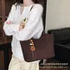 Bolso de Hombro Casual para Viajes de Trabajo Mujer Retro Otoño 2026 Nuevo Bolso de Hombro Único de Gamuza Bolso de Hombro de Moda