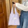 Bolsa de Ombro Ins Pequena Fresca Estampada com Laço Simples Grande Capacidade Satchel Feminina Bolsa de Lona Trabalho Deslocamento