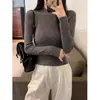 Top de punto hueco semitransparente negro con patchwork para mujer, otoño e invierno, camisa base sexy que ciñe la cintura, top corto ajustado con un diseño elegante