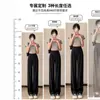 Pantalones negros de pierna ancha para mujer, nueva colección primavera 2026, con un diseño recto, de cintura alta, fluido, casual y versátil que estiliza y es ligero, resembling a suit pant