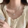 Collar de perlas de doble capa estilo retro francés para mujer, ligero, lujoso, de alta gama, con cadena para el cuello.