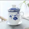 Taza Jingdezhen de Separación de Agua y Té con Tapa Filtro de Cerámica Taza para Té Aromático para el Hogar Juego de Cuatro Piezas Arte del Té Oficina