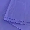 Tela de Cortavientos Suave Ultra-Delgada Resistente a las Arrugas con Rayas Verticales y Agujeros Redondos 40D Tela de Chaqueta de Plumas Tejida de Nylon
