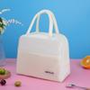Trabajador de oficina mano llevando bolsa lonchera bolsa aislante de papel de aluminio bolsa de almuerzo de gran capacidad bolsa de almuerzo engrosada de aspecto elegante