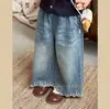 Novedades de OtoñoEstilo Coreano Otoño Nuevos Bebé Versátil Casual Encaje Bordado Floral Suave Jeans Lavados al Agua Tendencia