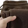 Atacado do fabricante coleção outono e inverno: calças masculinas forradas com fleece, grossas, confortáveis e quentes, com corte folgado, design versátil e tecido de veludo cotelê, em corte reto