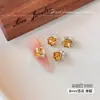 Lujo Ligero Brillo Cristal K9 Circonita Cúbica Amarilla Decoraciones para Uñas Otoño/Invierno Nueva Llegada Azúcar de Roca Copo de Nieve Huevo de Paloma Bolas de Circonita Cúbica para Uñas