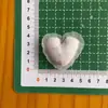 Primavera y verano 25 nuevo tejido relleno de algodón accesorios de amor pasador infantil moño decorativo accesorios para ropa infantil con broche
