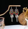 Pendientes de estilo nacional bohemio europeo y americano de turquesa azul, imitación de metal plateado Miao, pendientes de borlas vintage, venta al por mayor