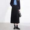Saia plissada elegante com design de cintura alta, corte em A soltinho, modelagem que afina e comprimento médio, adequada para outono e inverno, meia-saia elegante feminina