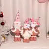 Adorno de Muñeca Retráctil Rosa Navideña Figura Luminosa de Papá Noel Muñeca de Piernas Largas Adorno Decorativo