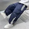 Pantalones de Primavera y Otoño para Niños 2026 Nuevo Estilo Holgado Casual Cargo Jogger para Niños Mayores