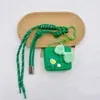 Cartera de Cuero Original para Monedas Bolsa para Auriculares Bluetooth Colgante Serie Miu Llavero Bolsa Pequeña de Regalo de Gama Alta
