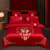Juego de ropa de cama de lujo estilo chino, hecho de algodón 100% de fibra larga, un juego de cuatro piezas que incluye una sábana y una funda de edredón de algodón puro rojo, perfecto para la alcoba de una recién casada.