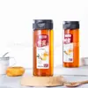 FG53117FG53143FG53192 Botella de Plástico Cilíndrica Botella para Miel Válvula de Silicona Frasco de Plástico PET250ML