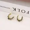 Pendientes nuevos y sencillos pendientes únicos diseño de nicho pendientes de temperamento de alta calidad pendientes de circonita con diamante gris de lujo ligero para mujer