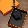Colgante de minibolso de cesta, llavero de coche de cuero de alta calidad, funda para auriculares, decoración creativa para coche, venta al por mayor