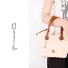 Venta Directa de Fábrica Bolso con Colgante de Cuentas de Madera Natural Cascabel de Pie de la Suerte Llavero Colgante Personalizado Creativo Tejido a Mano DIY