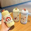 Mini taza térmica de dibujos animados con temática de manzana, una botella de agua linda y elegante para niñas, portátil y compacta, perfecta para llevar de viaje.