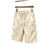 Shorts masculinos estilo americano para o verão de 2026, nova marca da moda, shorts estilo americano de secagem rápida no joelho, calças casuais largas para adolescentes e homens